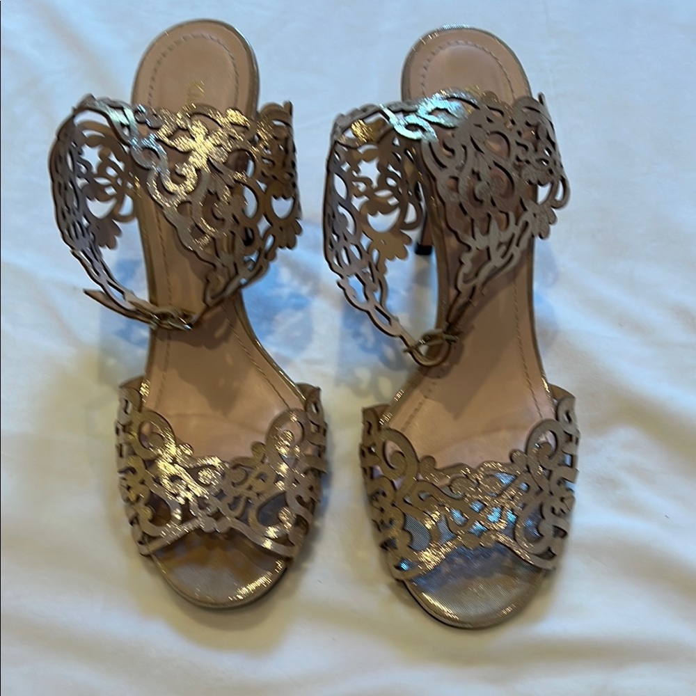 Gold High Heel Sandals with Ankle Strap and Intricate Design